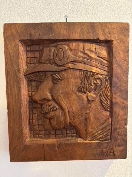 Miner relief carving